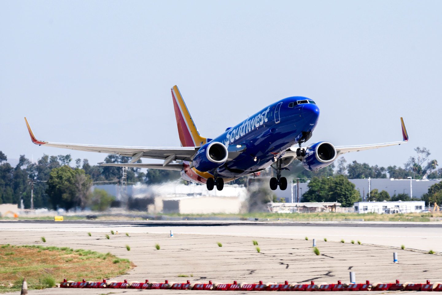 Ontario, CA - September 19: Ontario, CA - September 19: A Southwest Airlines airplane takes off on the runway, as ongoing maintenance construction takes place on existing runways and taxiways at Ontario International Airport in Ontario on Tuesday, Sept. 19, 2023. Ontario International Airport secured nearly $16 million in federal funding for essential runway upgrades. (Photo by Watchara Phomicinda/MediaNews Group/The Press-Enterprise via Getty Images)